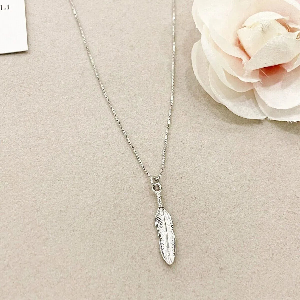 collana piuma argento 925